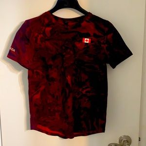 The iconic Love Crew Canadian Olympic red tshirt